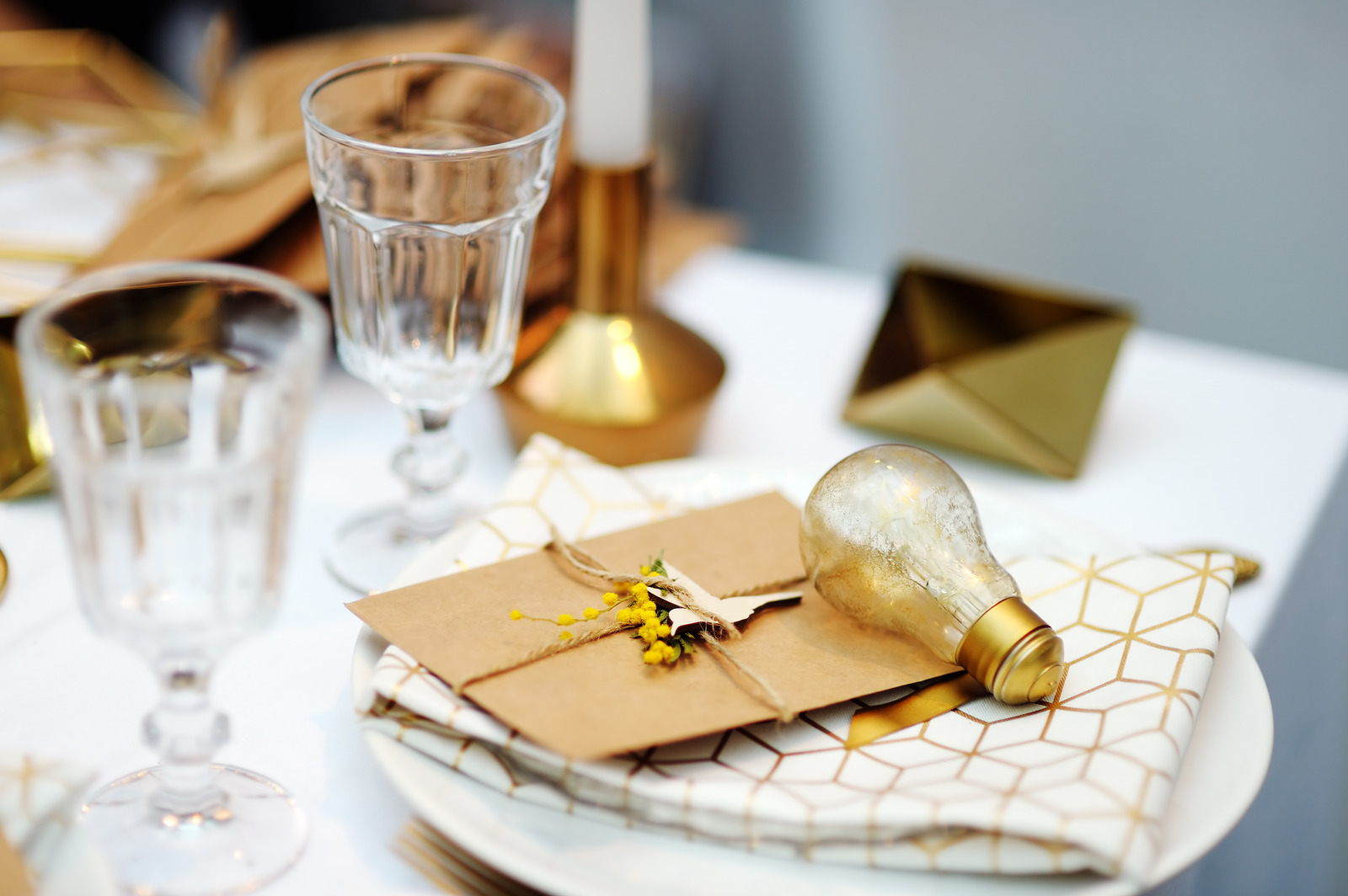 Stylish gold table set with letter